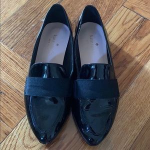 Kate Spade black flats in size 5.
